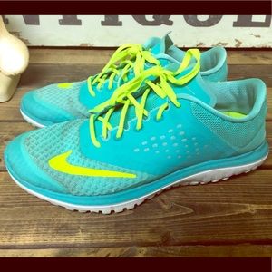 Size 7.5 turquoise Nikes.
